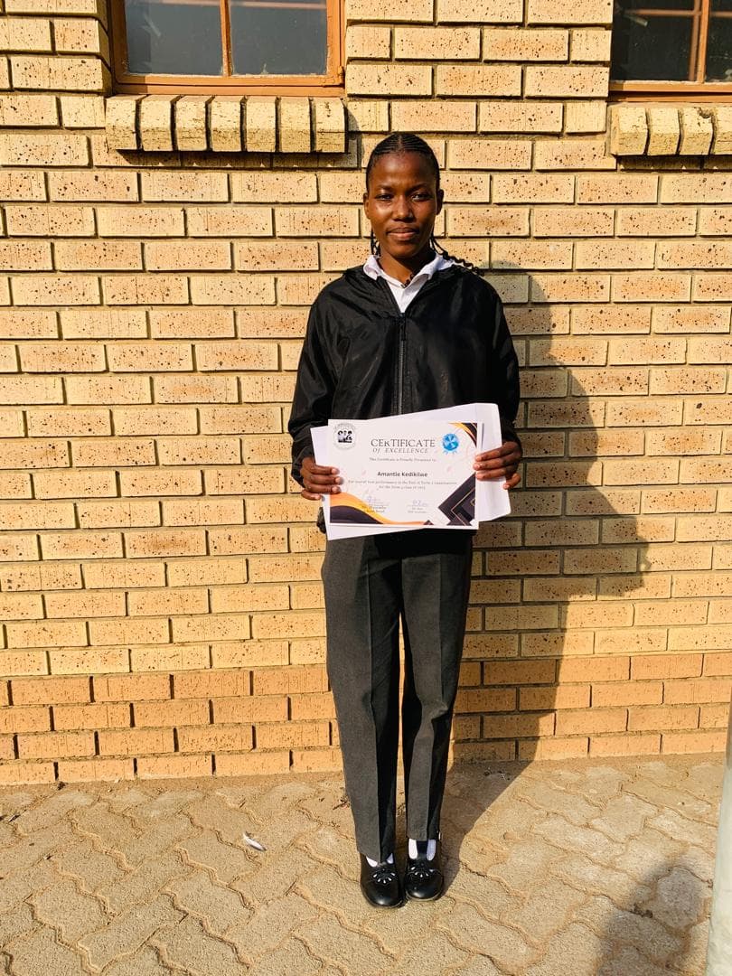 Student with certificate